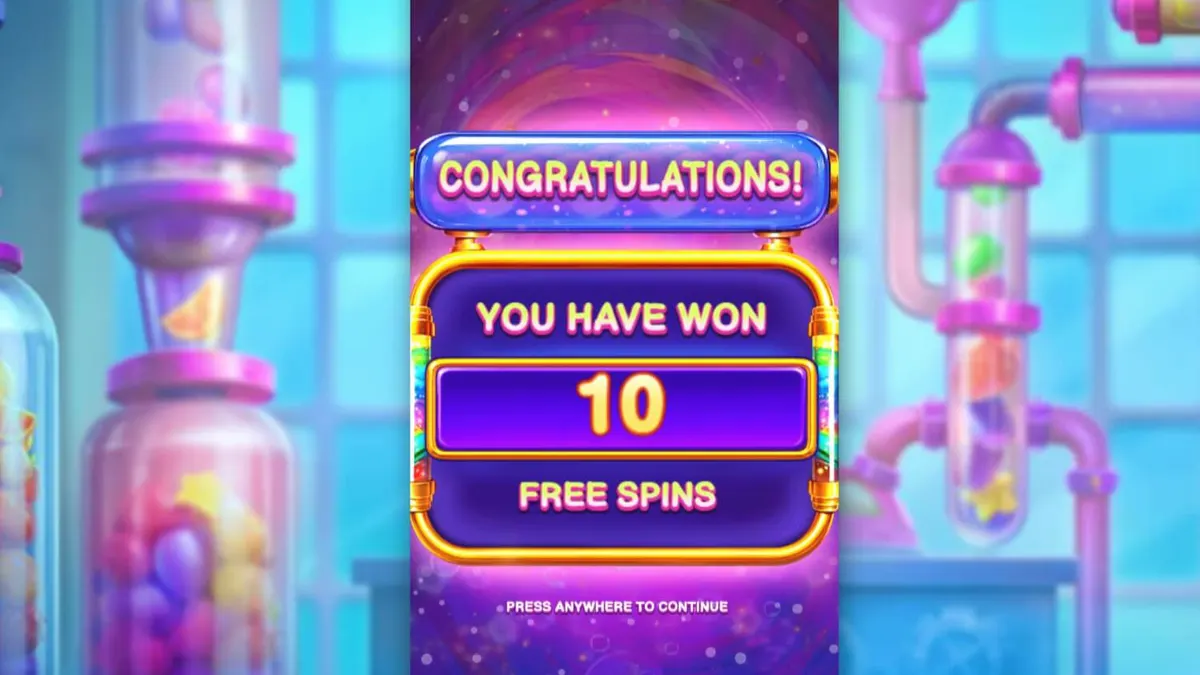 Tampilan layar game slot Sweet Burst dari Pragmatic Play dengan tema pabrik permen futuristik dan simbol permen berwarna-warni.